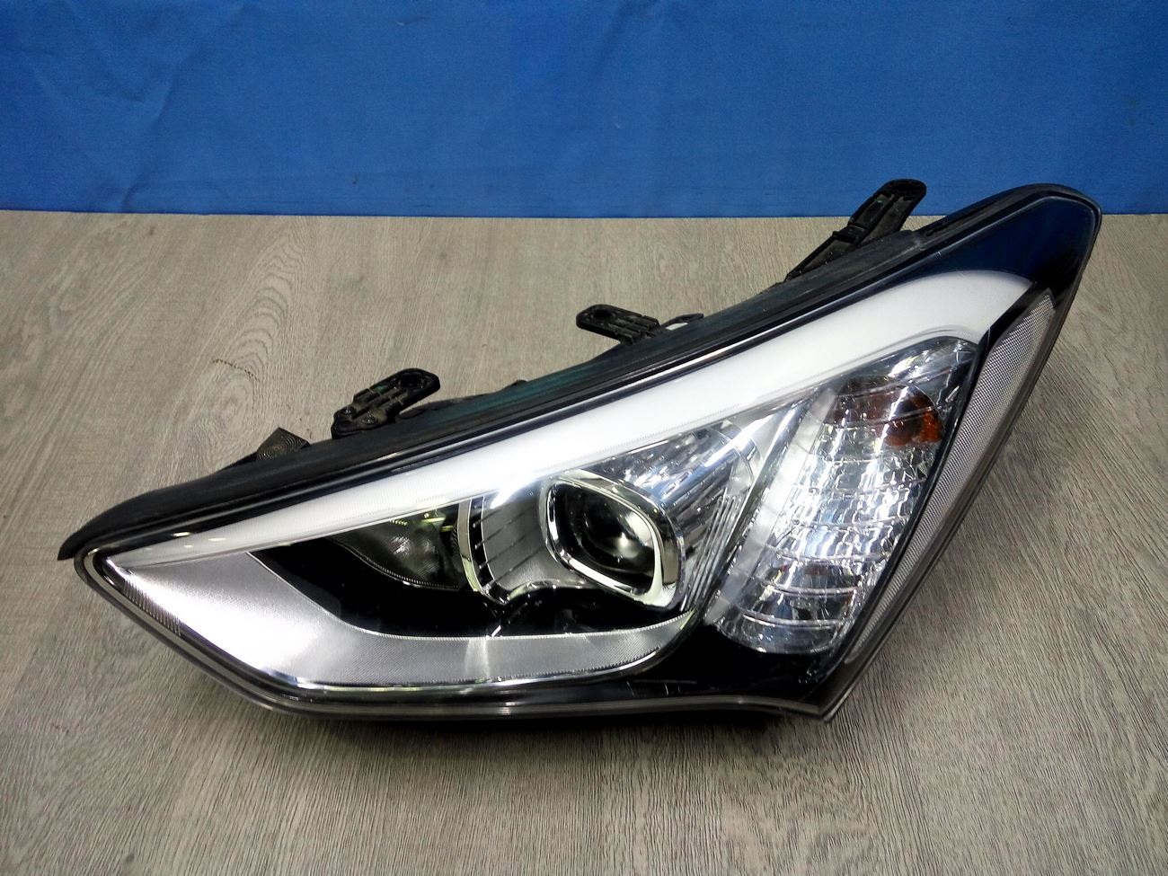 Фара левая Hyundai Santa Fe 3 DM (2012-2015)