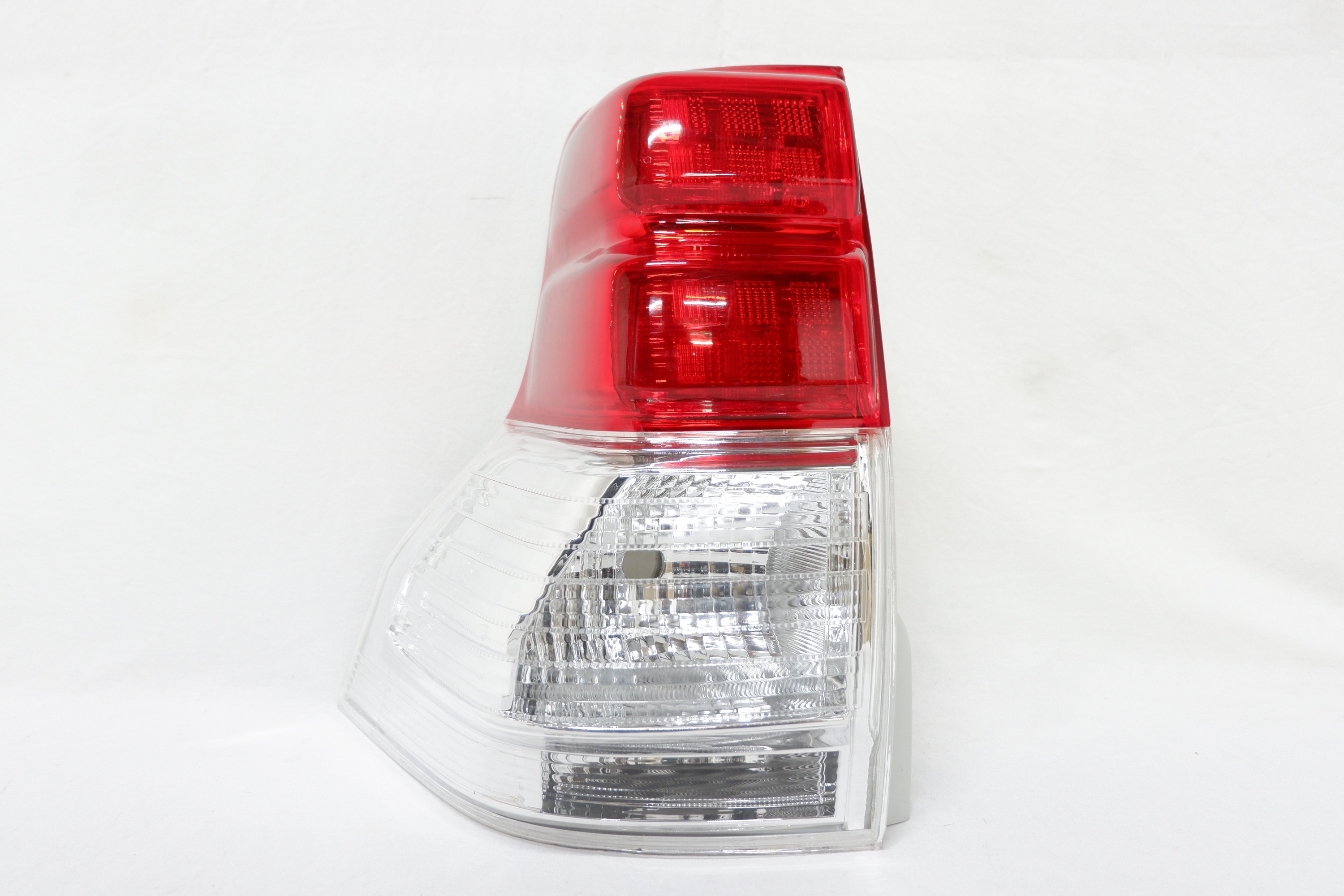 Фонарь левый Toyota Land Cruiser Prado 150 (2009-2013)